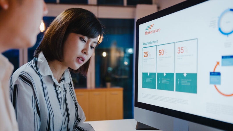 Increase digital presence for better market share. Business woman analysing market share.
